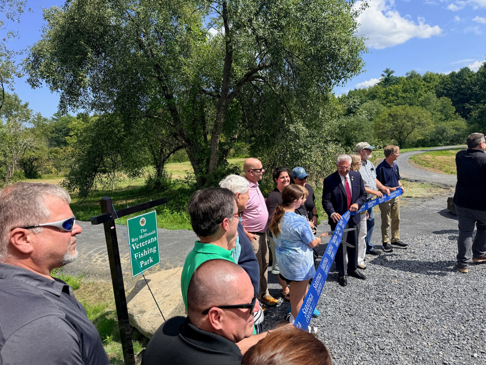Ribbon cutting at the Roy McDonald Veterans Fishing Park in Wilton, NY